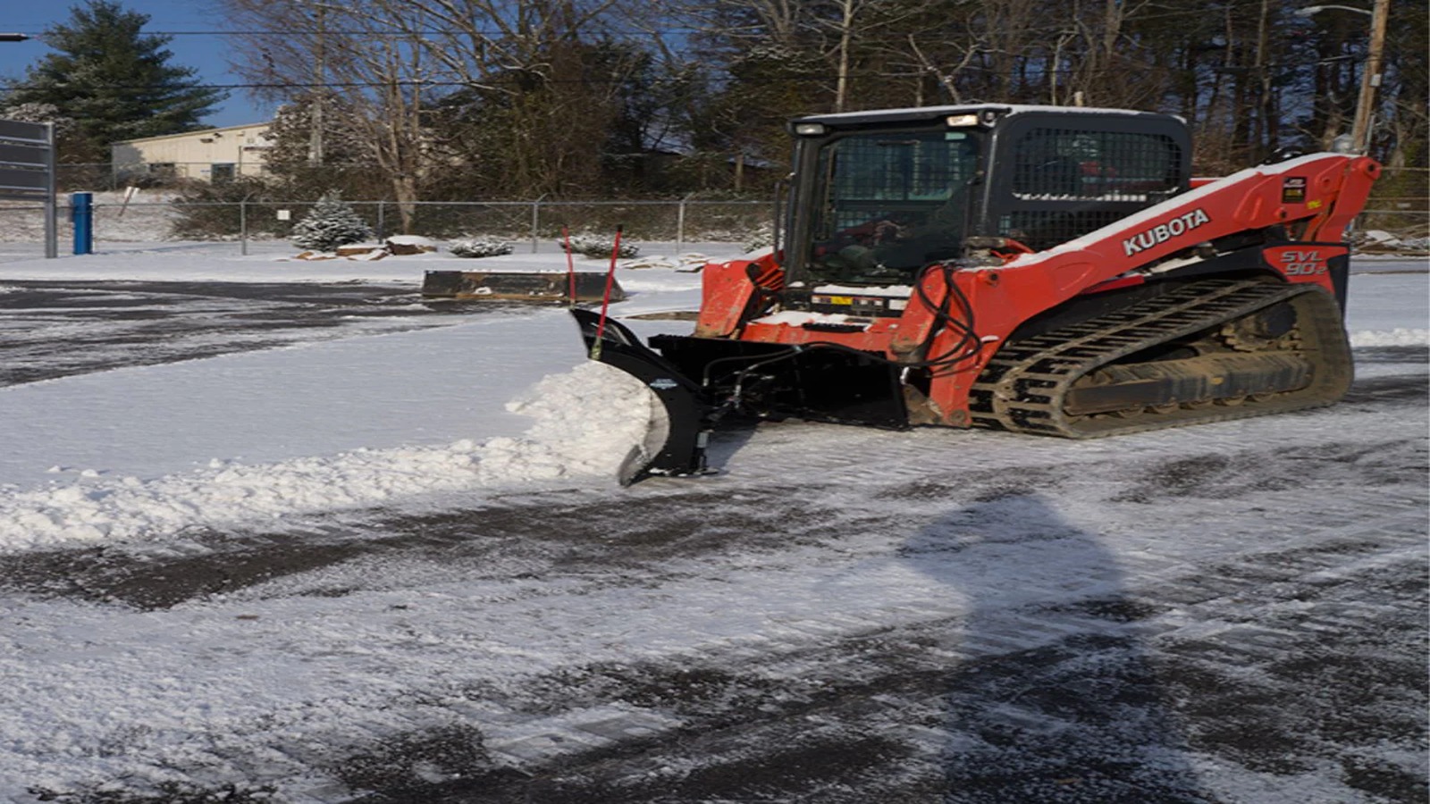 Freshly cleared residential driveway after snowfall in Sioux Falls SD